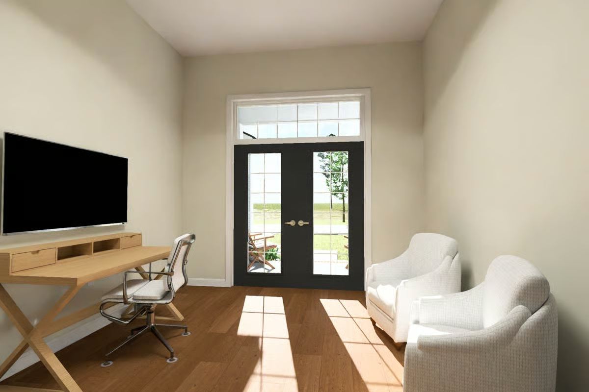 Bright Home Office with Black Glass Doors Leading to Outdoor Patio