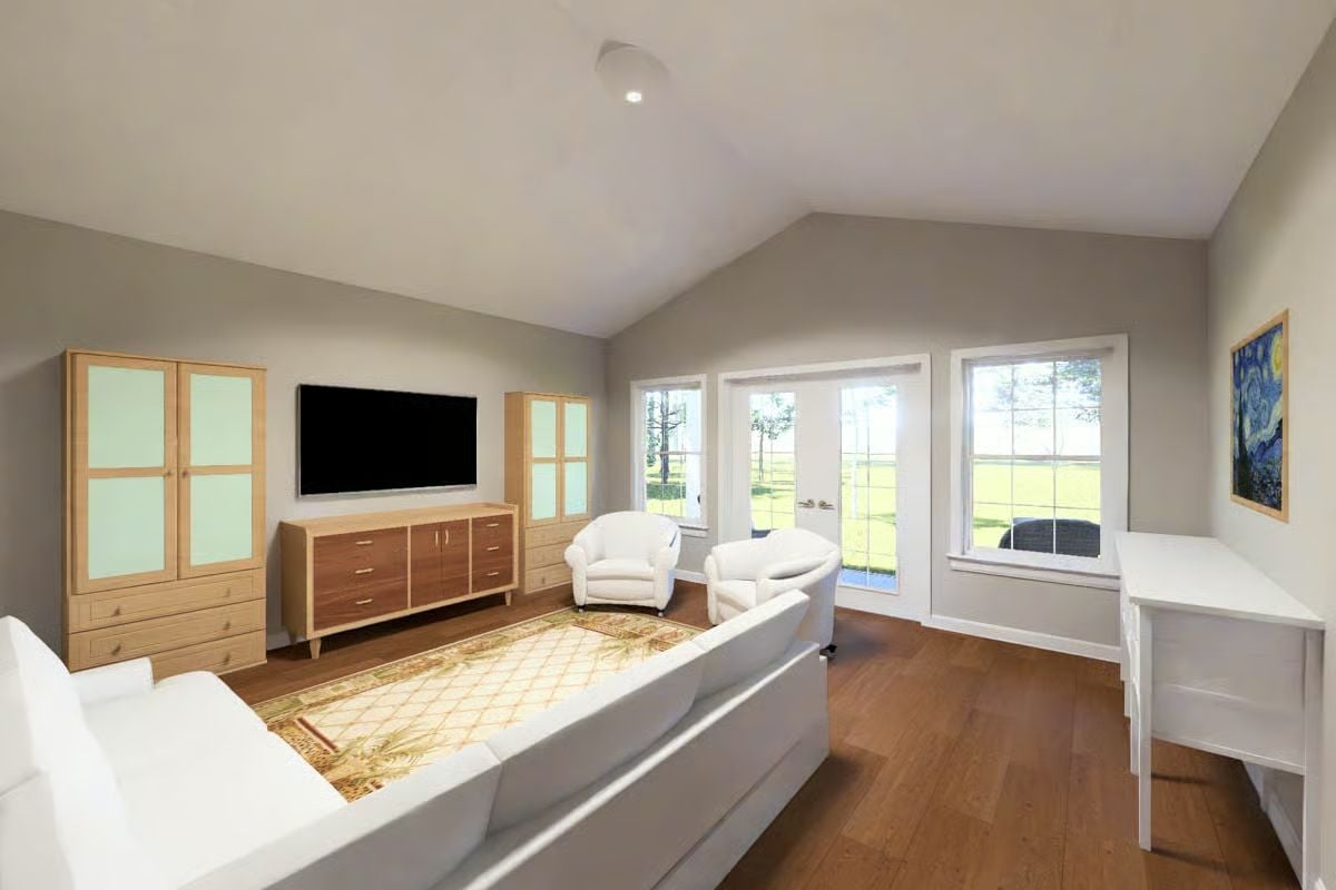 Primary Bedroom Suite with Wall-Mounted TV and Dual Seating Area