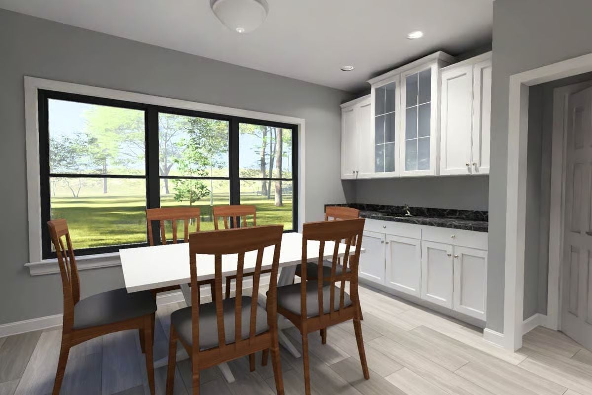 Dining Area with Black-Framed Windows and White Shaker Cabinetry