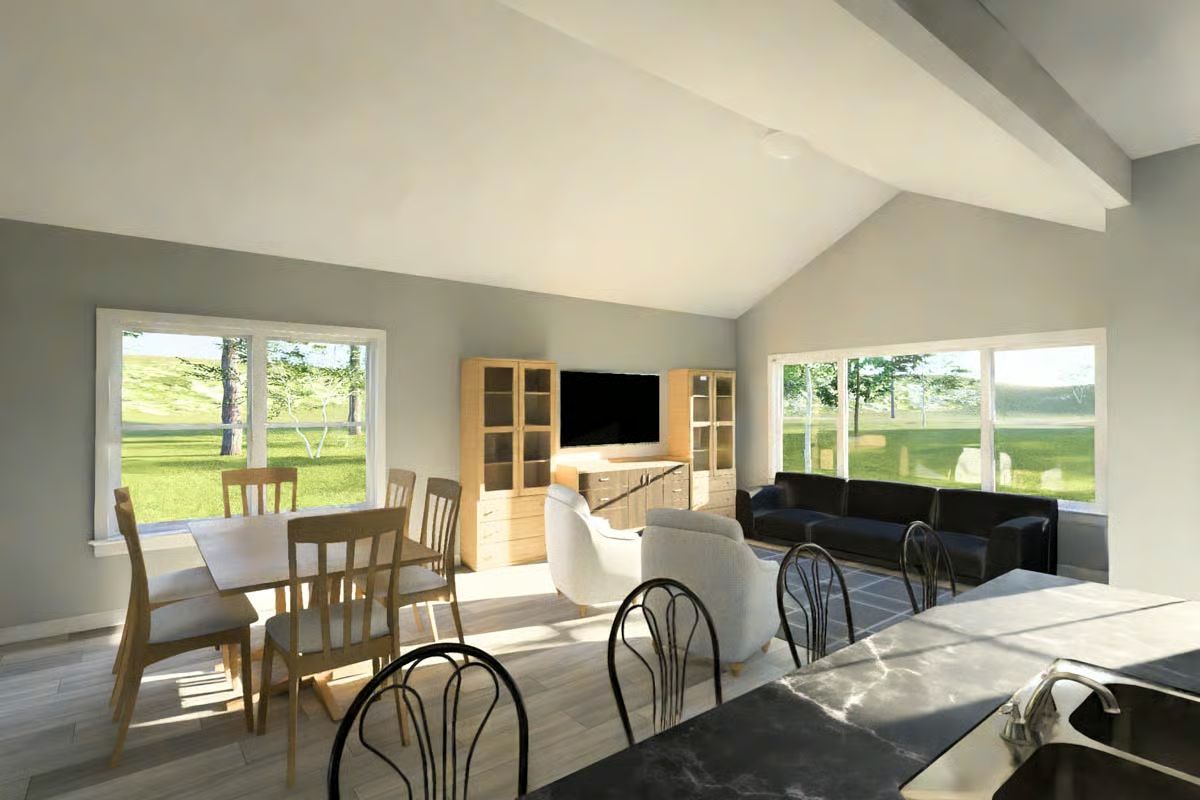 Open Concept Living Area with Vaulted Ceiling and Entertainment Center