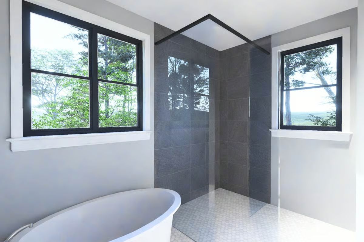 Freestanding Tub and Walk-In Shower with Dark Tile Surround