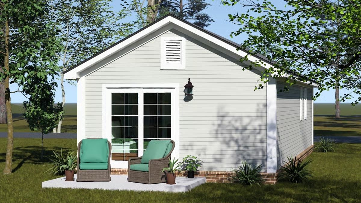 Wicker Chairs and White Siding on a Compact Cottage Patio