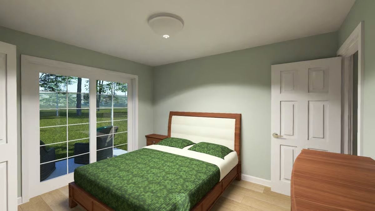 Green Bedding and French Doors Opening to a Grassy Backyard