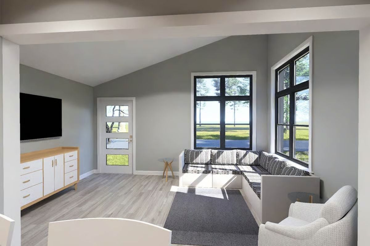 Vaulted Ceilings and Corner Windows Pull the Outdoors Into a Compact Living Space