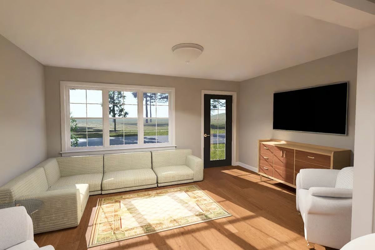 Sunlit Living Room Pairs Sectional Seating with Warm Hardwood Floors
