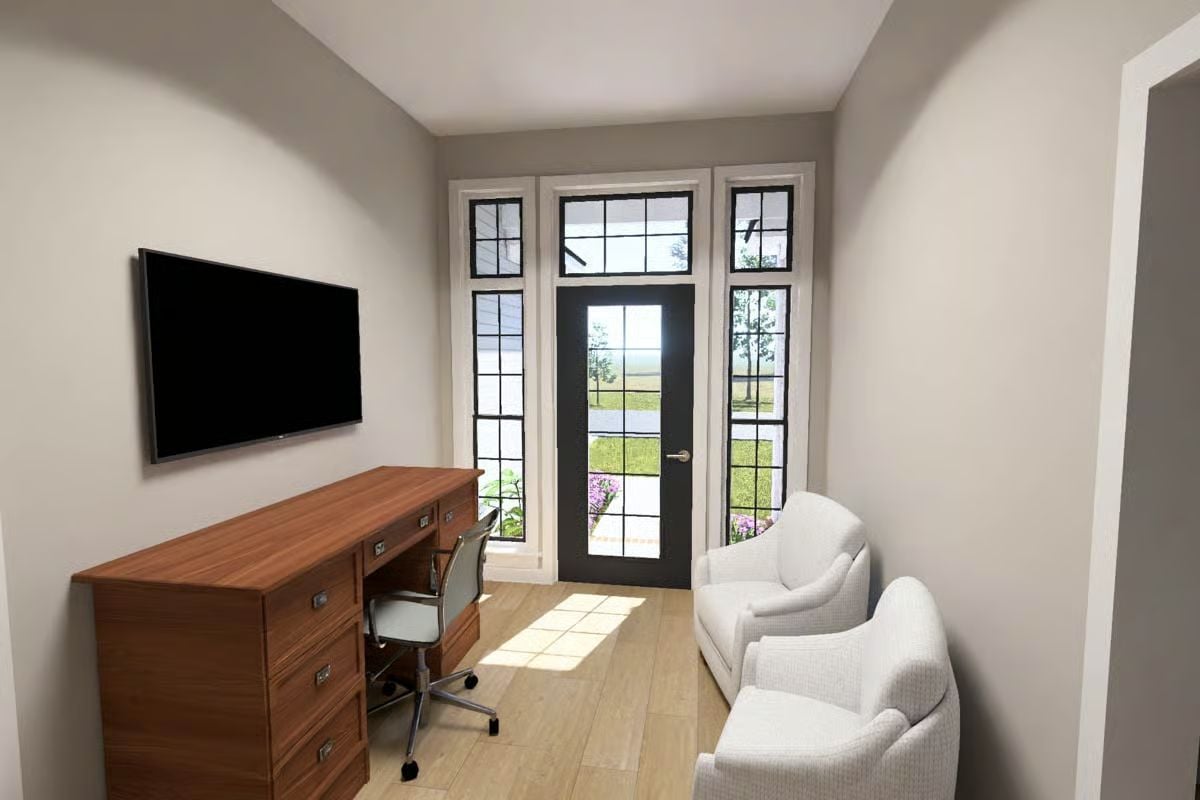 Home Office with Garden Door Access and Wall-Mounted TV