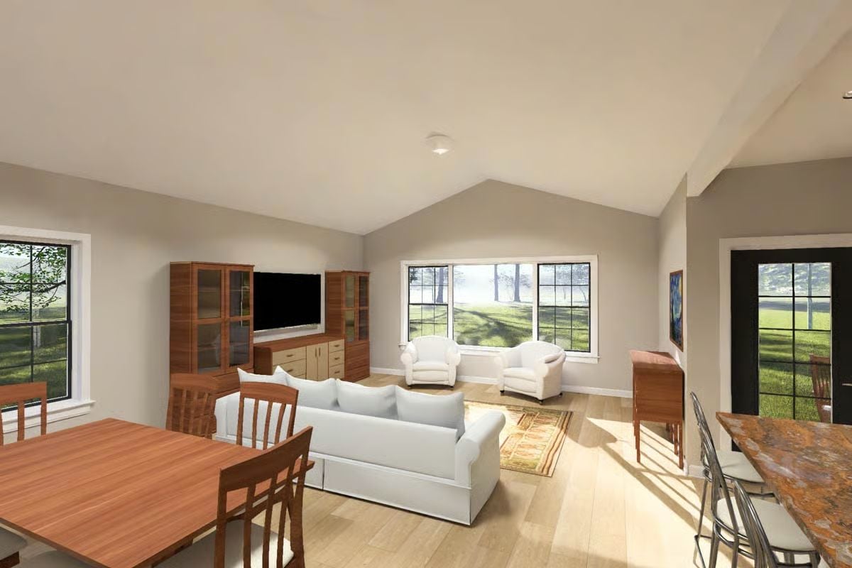 Vaulted Ceilings and Light Wood Floors Open Up the Living Space