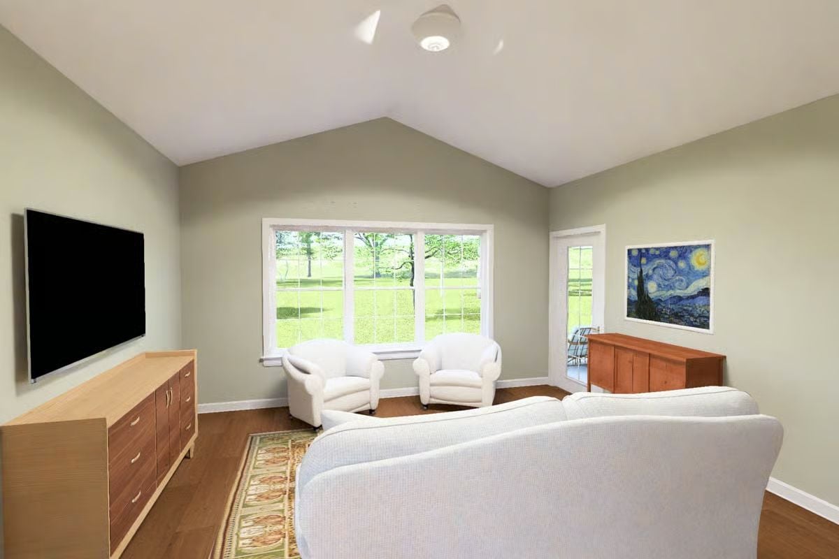 Vaulted Ceilings and White Upholstery Keep This Living Room Calm and Comfortable
