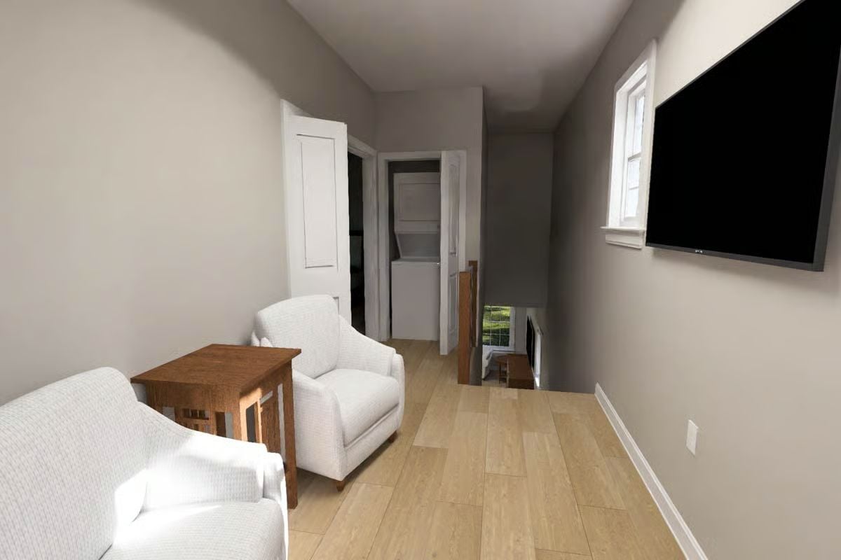 Compact TV Loft Pairs White Armchairs with Warm Wood Flooring