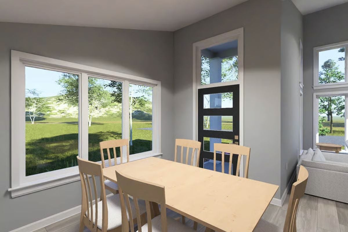 Warm Wood Tones and Wide Windows Define This Casual Dining Nook