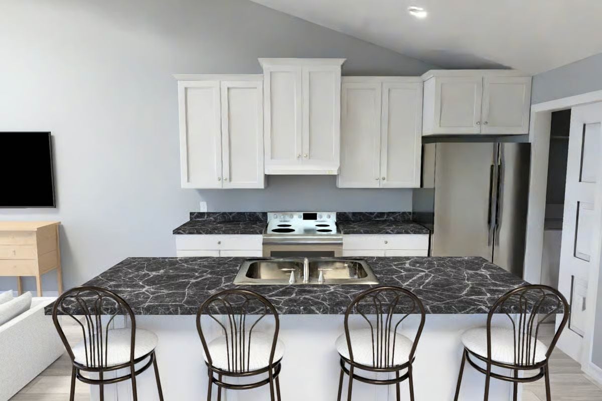 Dark Marble Countertops Anchor This Open Kitchen and Breakfast Bar