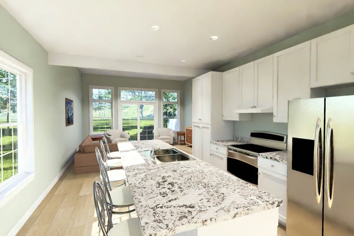 Granite Island Kitchen Opens Into a Casual Living Space