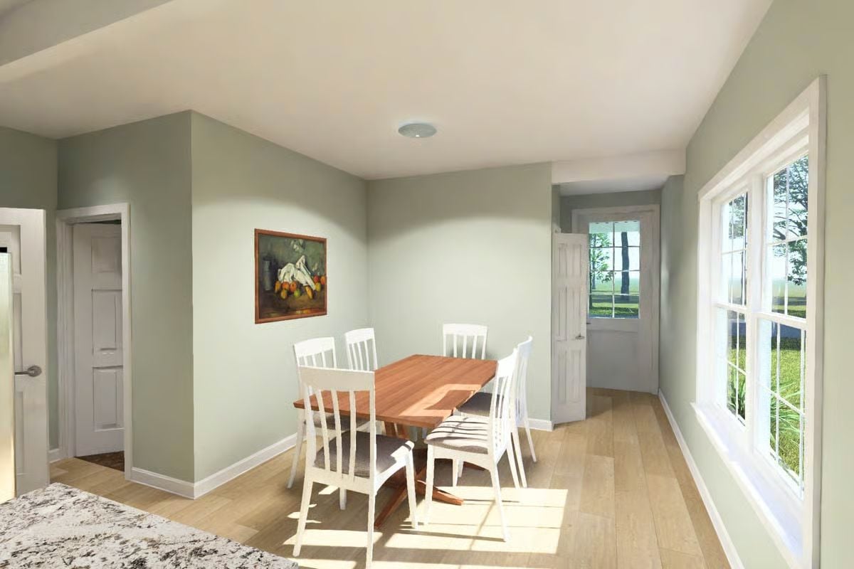 Warm Wood Table Anchors a Dining Room Bathed in Afternoon Light