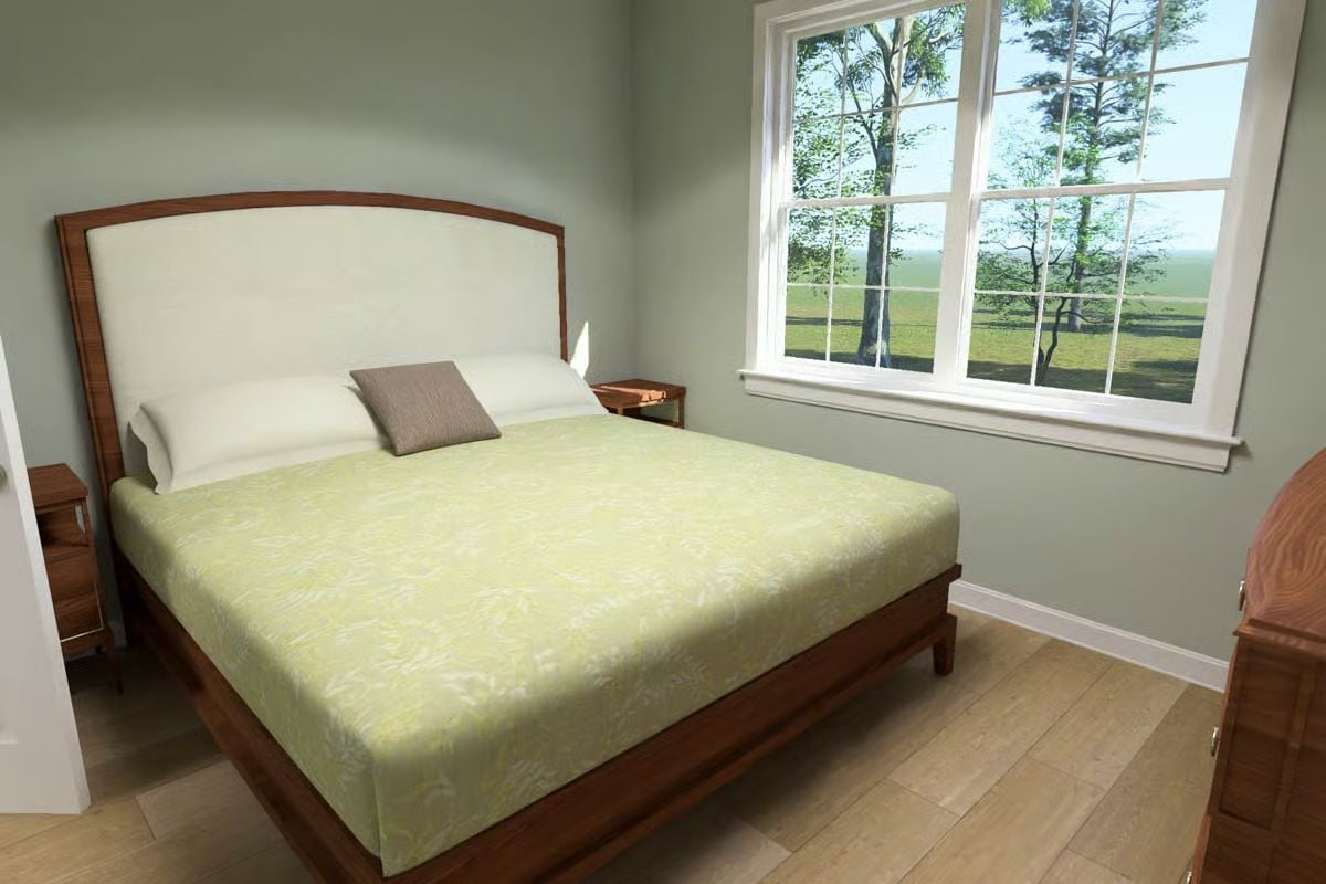 Green Bedding and Wood Tones Bring Garden-Fresh Calm to a Country Bedroom