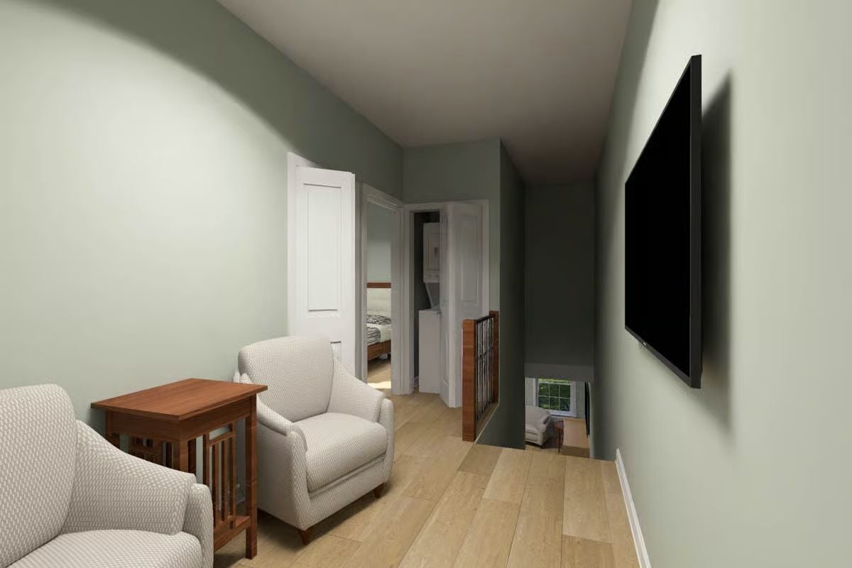 Open Loft Landing Puts a Wall-Mounted TV Above the Stair Rail