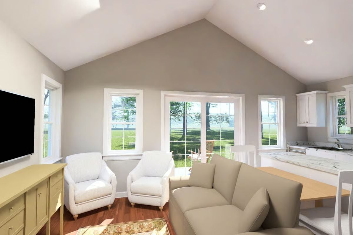 Vaulted Ceilings and Natural Light Define This Cottage Living Space