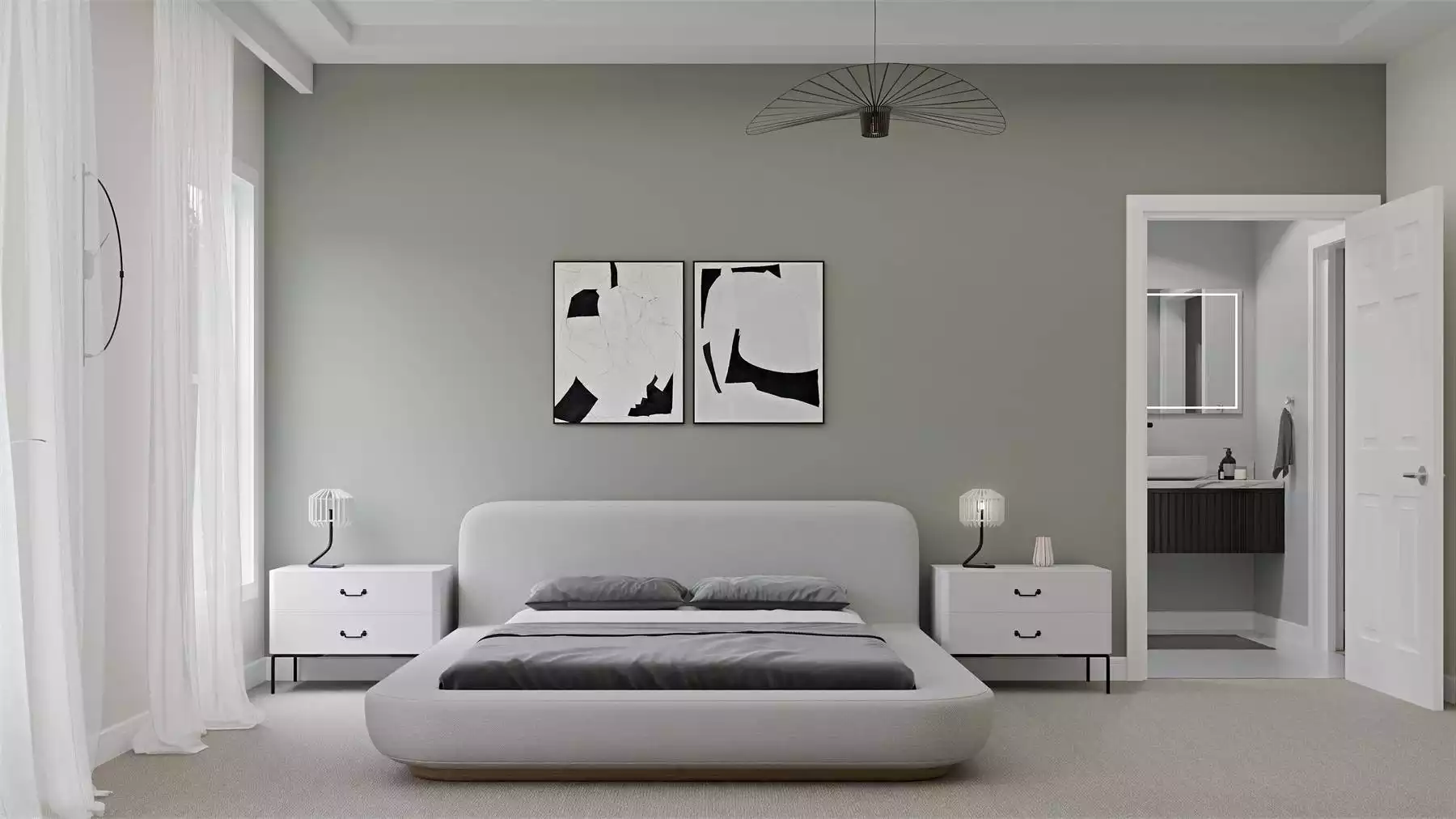 Soft Grey Tones and Rounded Upholstery Shape a Calm Primary Bedroom