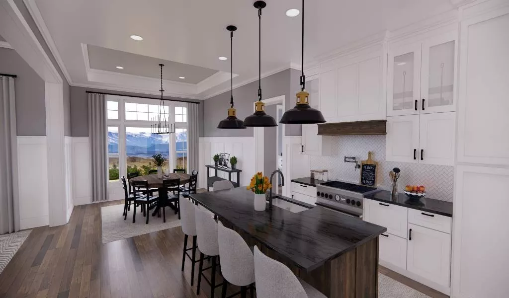 Pendant Lights Over a Dark Island Anchor This Kitchen-Dining Connection