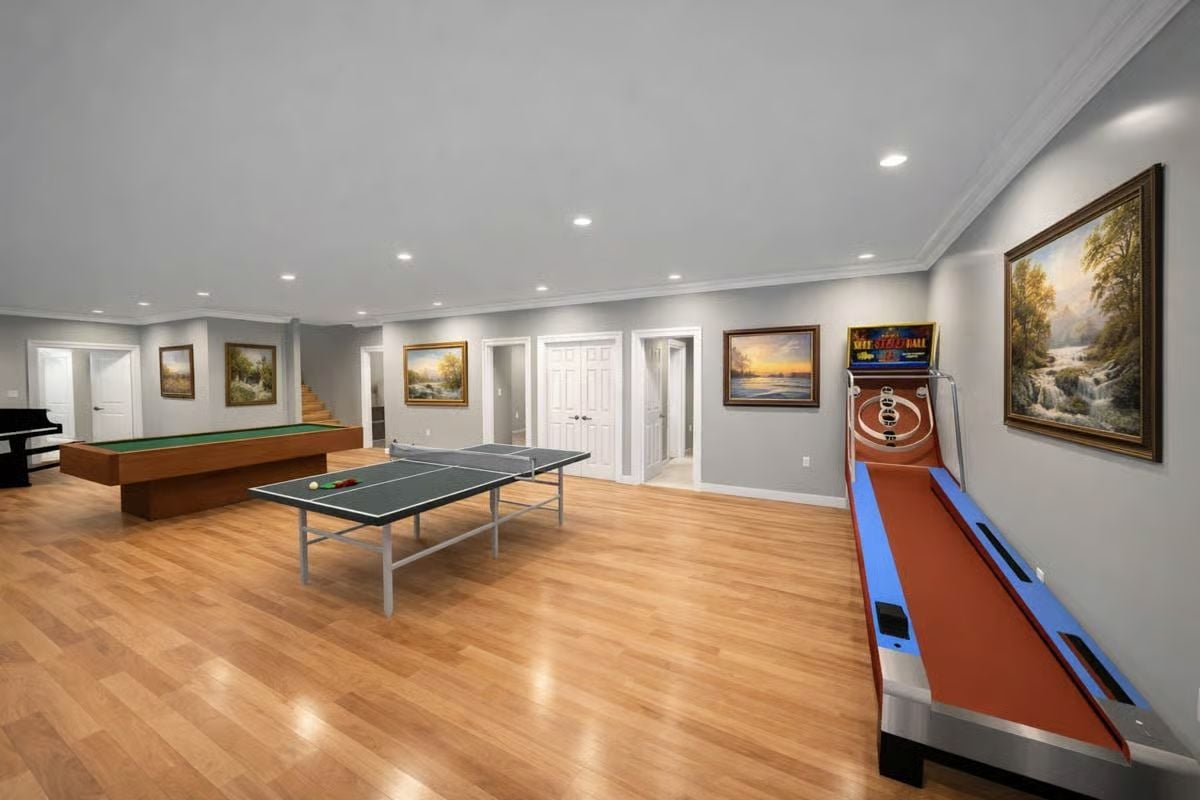 Skee-Ball, Billiards, and Ping-Pong Pack This Finished Basement Game Room