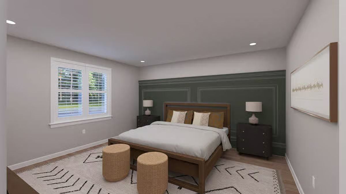 Sage Green Wainscoting Sets a Grounded Tone in the Primary Bedroom