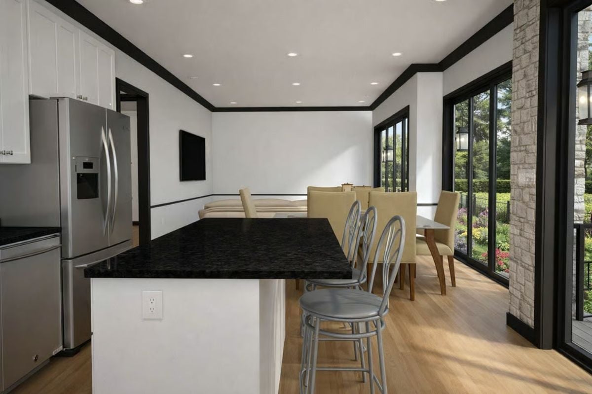 Open-Plan Kitchen Flows Into Dining and Living With Black Granite Anchoring the Space