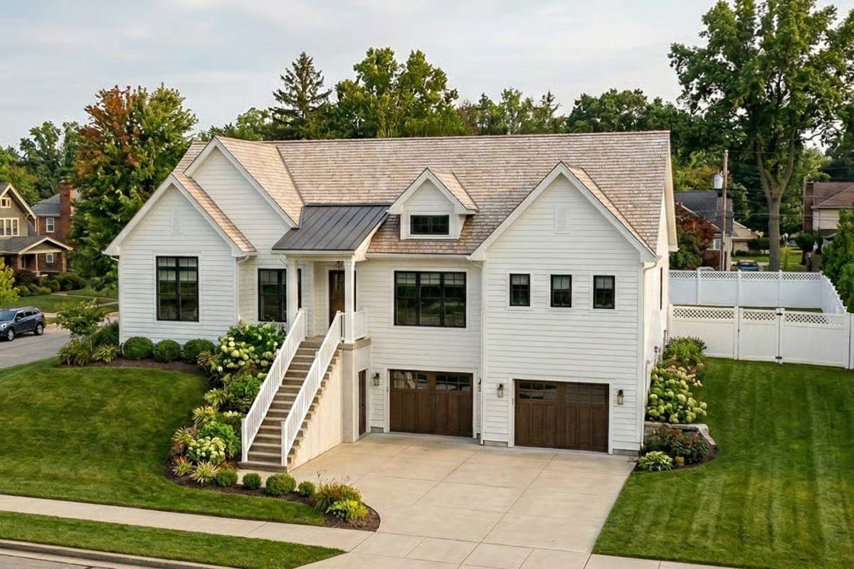 Traditional-Style 3-Bedroom Home for a Sloped Lot with 2-Car Garage and Open Living Space (Floor Plan)