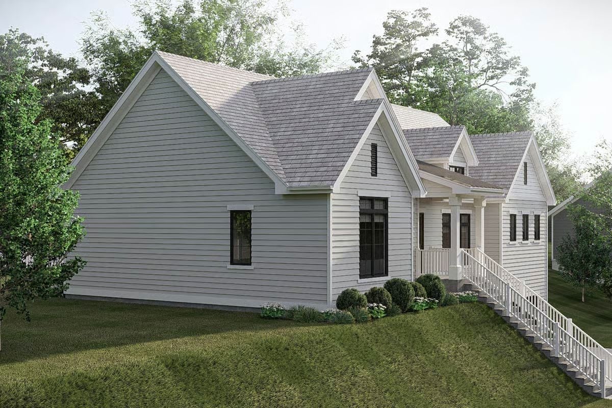 Gray and White Farmhouse Exterior with Multiple Gabled Rooflines