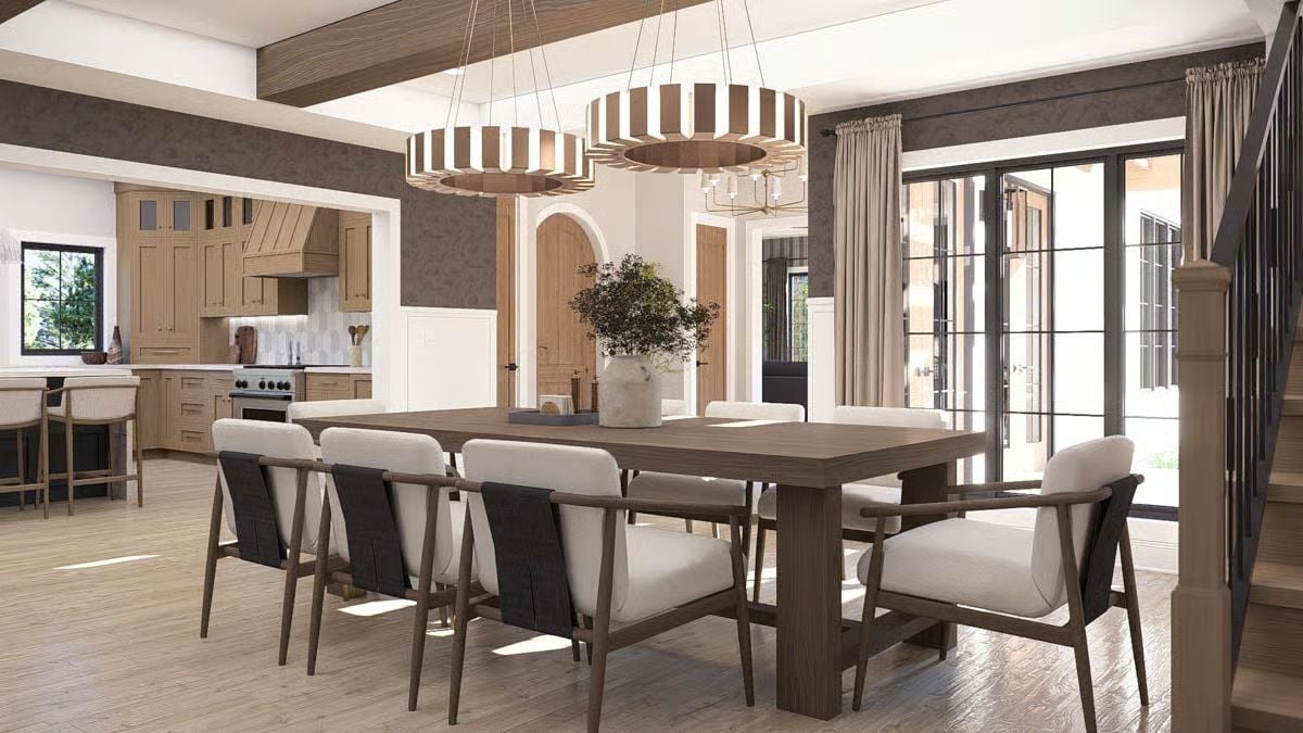 Warm Wood Tones and Tiered Pendants Define This Open Dining Space