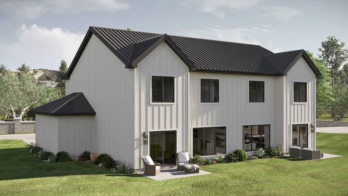 Board-and-Batten Siding Meets Dark Metal Roofing on This Duplex Rear Exterior