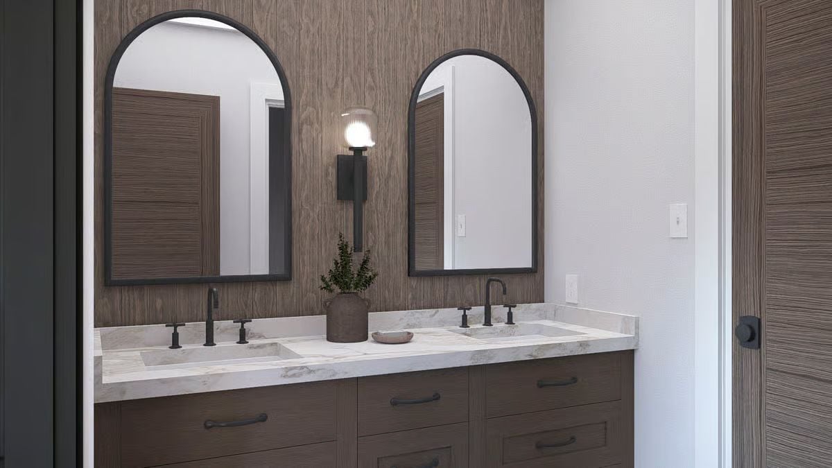Dual Arched Mirrors and Matte Black Hardware Set the Tone in This Primary Bath