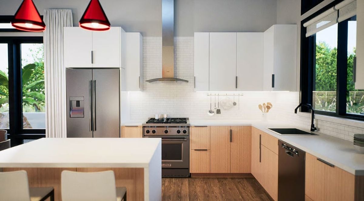 Red Pendants and Warm Wood Tones Anchor an Open-Plan Kitchen