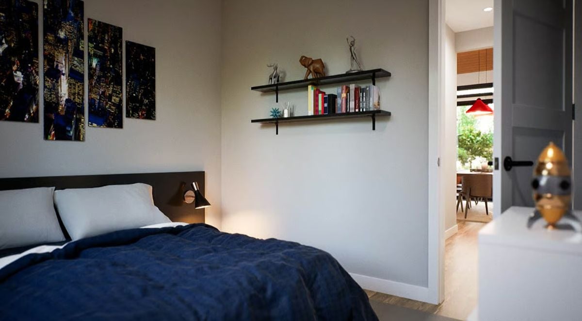 Navy Bedding, City Skyline Prints, and Floating Shelves in a Ranch Bedroom