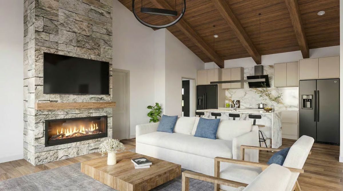 Open Concept Living with Stacked Stone Fireplace and Wood Beam Ceiling