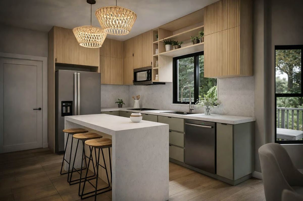 Sage Cabinets and Rattan Pendants Give This Kitchen Its Quiet Character