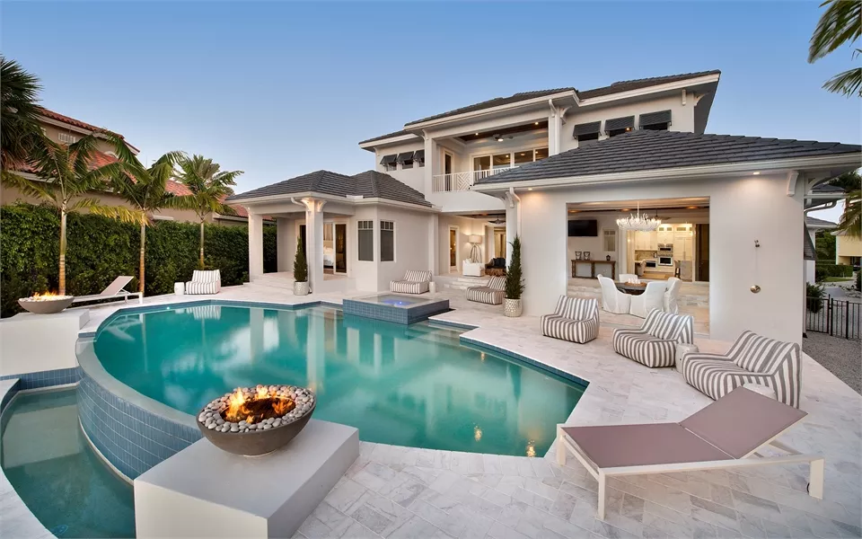 Fire Bowl, Freeform Pool, and Open-Air Living Room Define This Outdoor Retreat