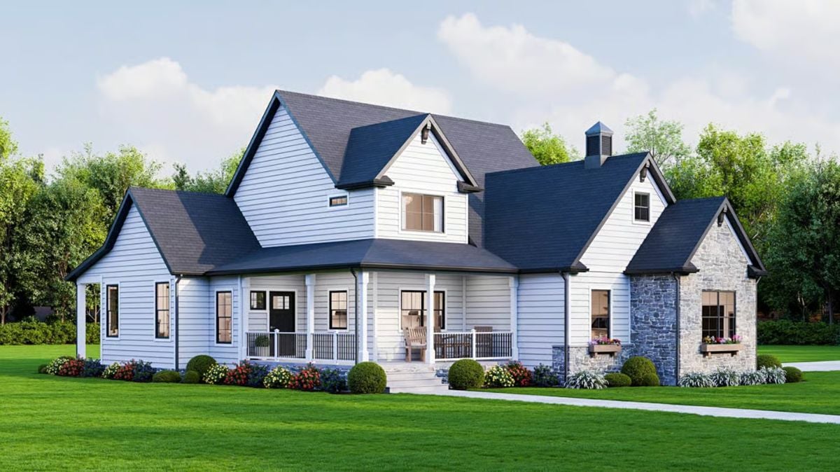 Light Gray Farmhouse with Wraparound Porch and Stone Chimney