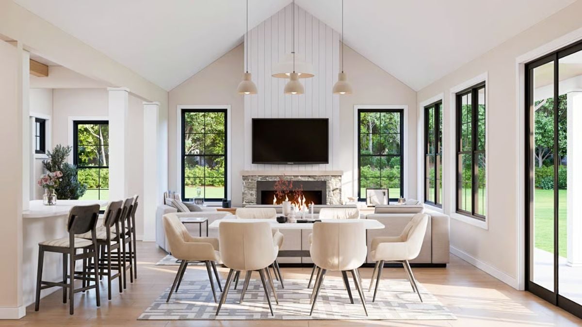 Open Concept Living with Vaulted Ceilings and Black-Framed Windows