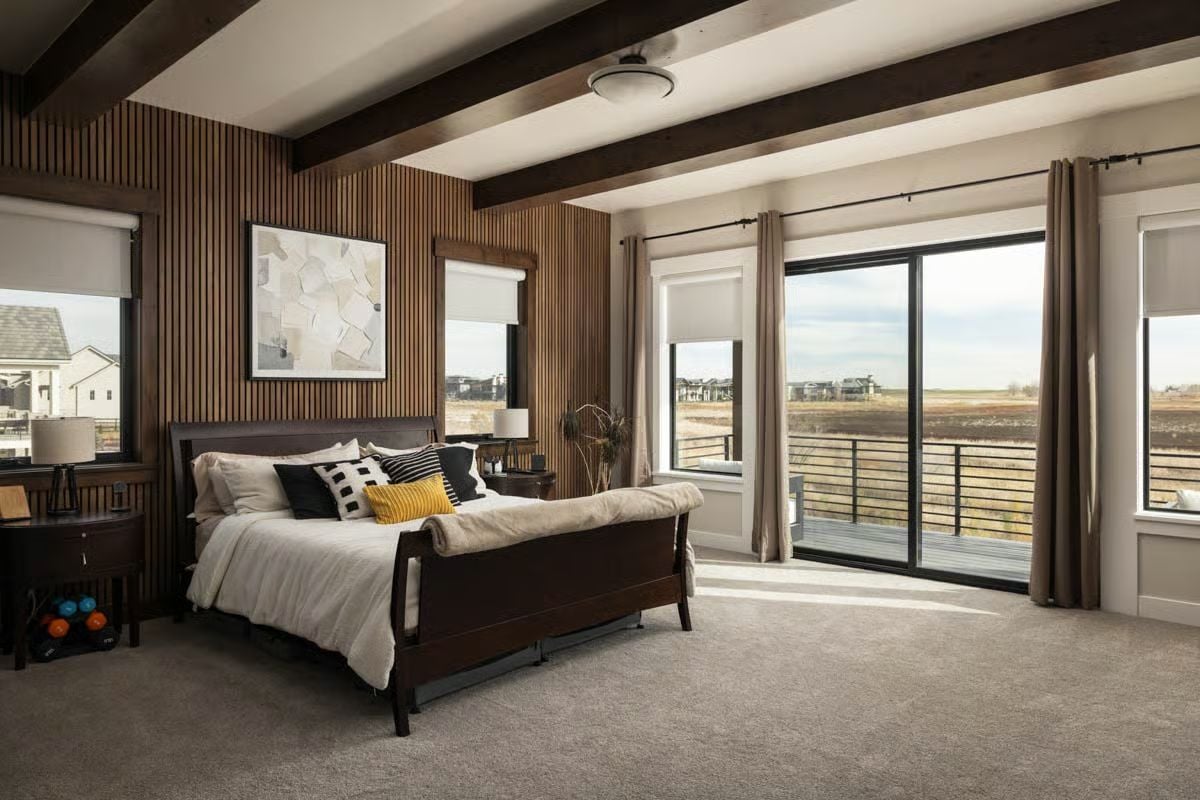 Exposed Ceiling Beams and a Wood Slat Accent Wall Set the Tone for This Primary Suite