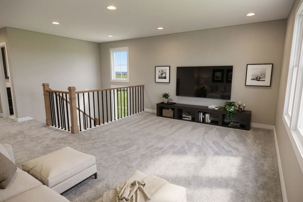 Loft Media Space Floats Above the Staircase with Room to Breathe