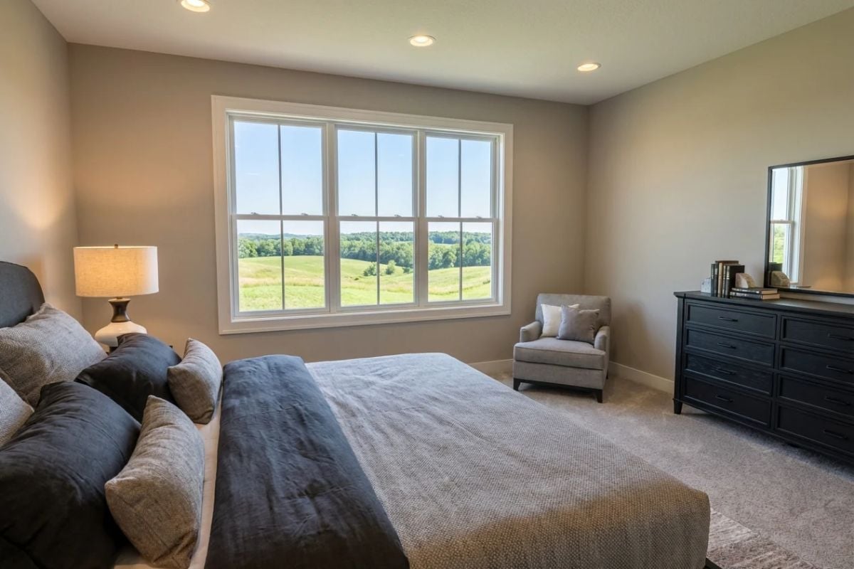Rolling Fields Beyond the Glass Turn a Bedroom Window Into Living Art