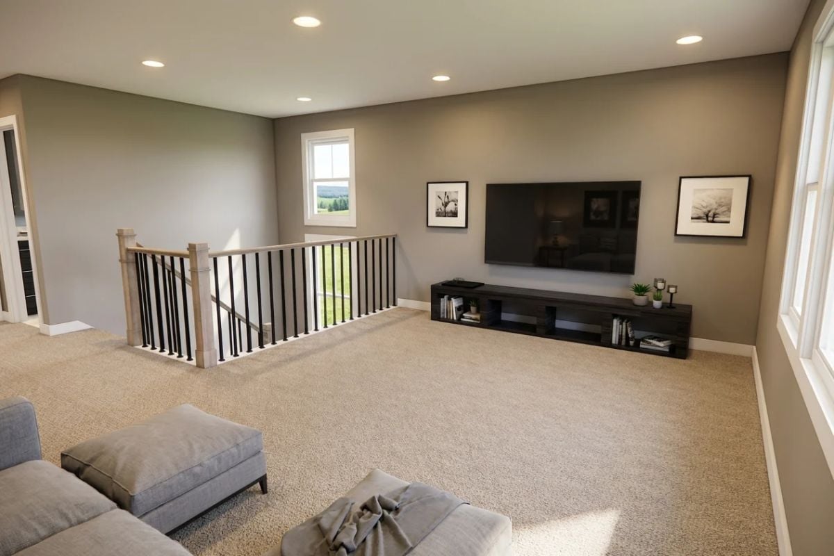 Loft Media Space Balances Open Staircase Rail With Wall-Mounted TV