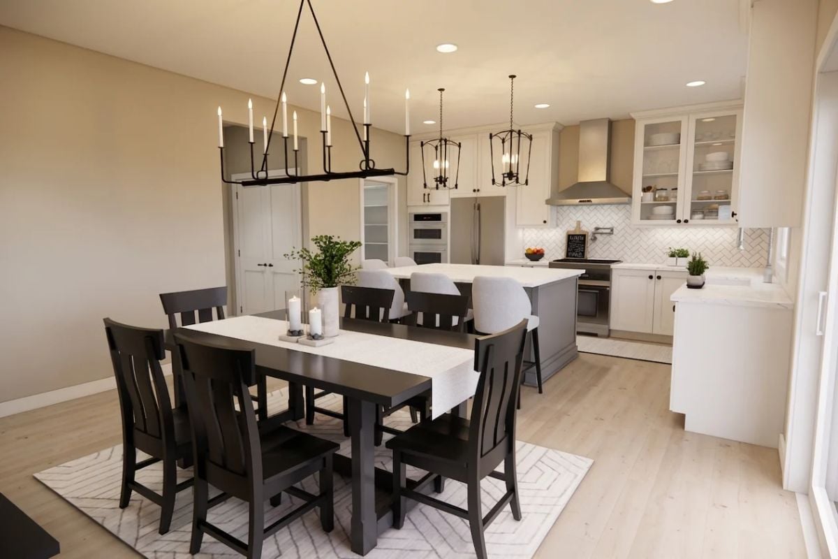 Candle-Style Chandelier Sets the Tone in an Open-Concept Dining and Kitchen Space