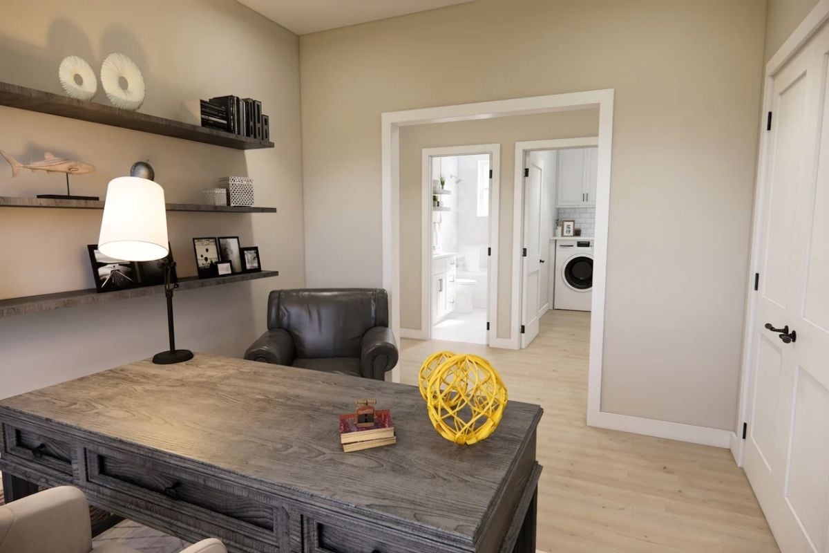 Rustic Desk and Floating Shelves Shape a Home Office with Direct Laundry Access