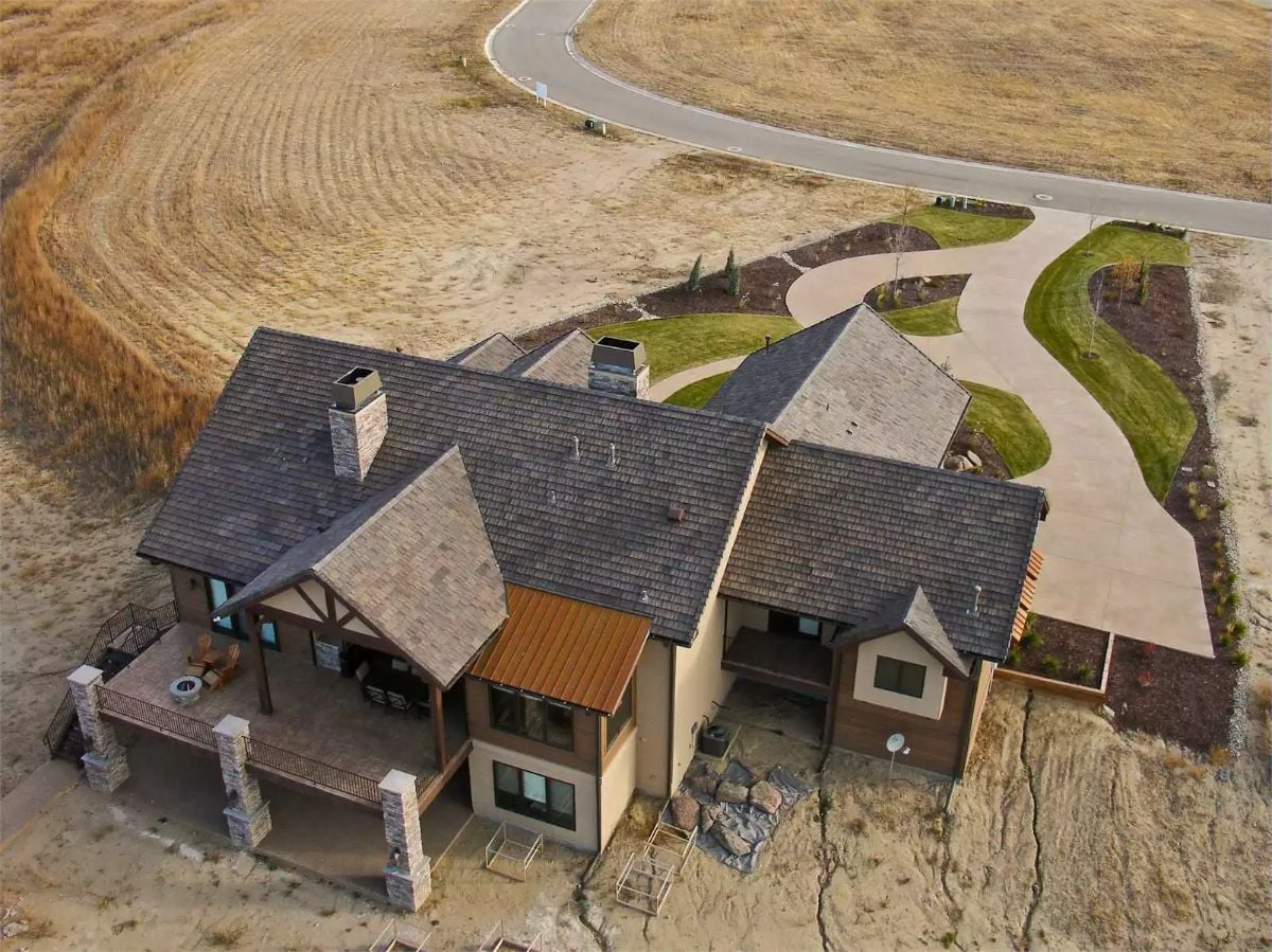 Aerial View of Craftsman Estate Perched on Open Prairie Land
