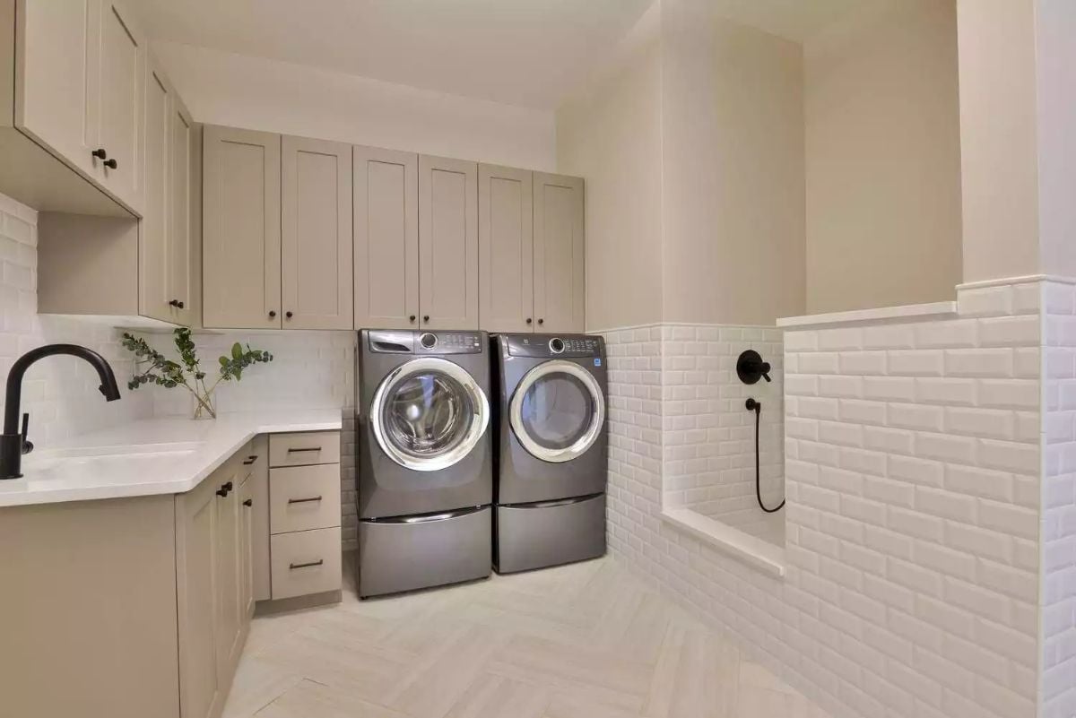 Pedestal Washer-Dryer Pair Anchors a Laundry Room Built to Last