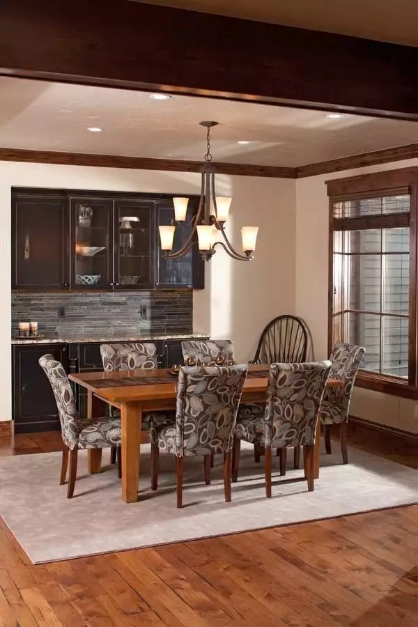 Dark Cabinetry and Patterned Upholstery Give This Dining Room Serious Character