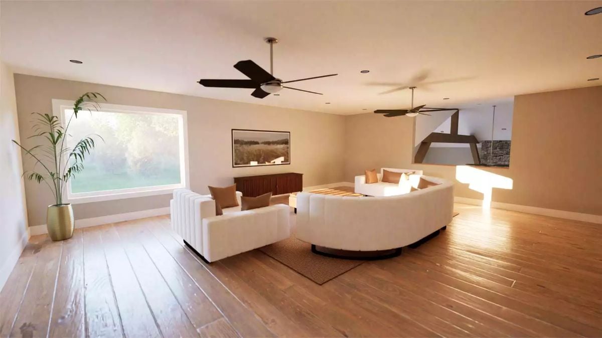 Curved Sectional Anchors Open Living Room with Dual Ceiling Fans