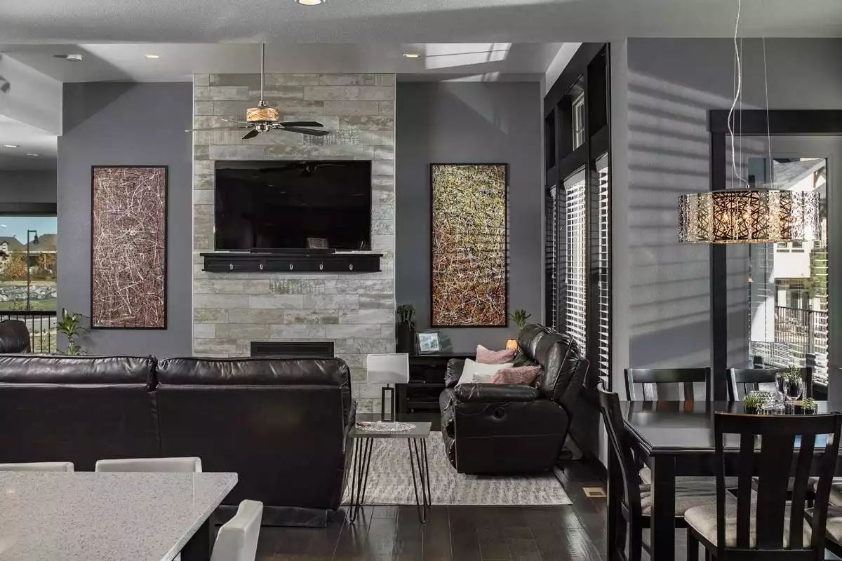 Dark Leather and Stone Create a Living Room Built for Real Life