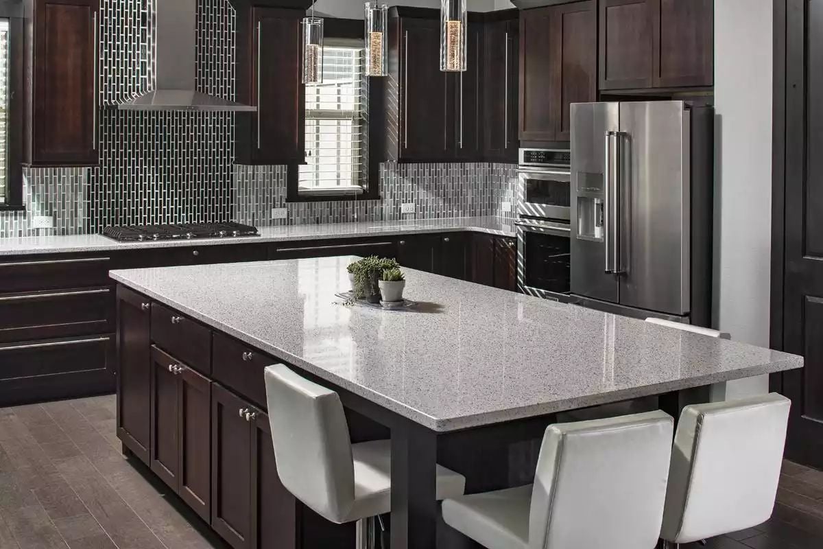 Dark Cabinets and Granite Make This Kitchen Feel Grounded and Bold