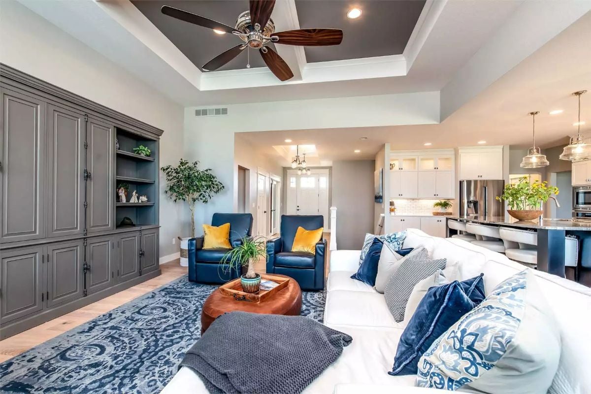 Open-Concept Living with Tray Ceiling and Custom Built-Ins